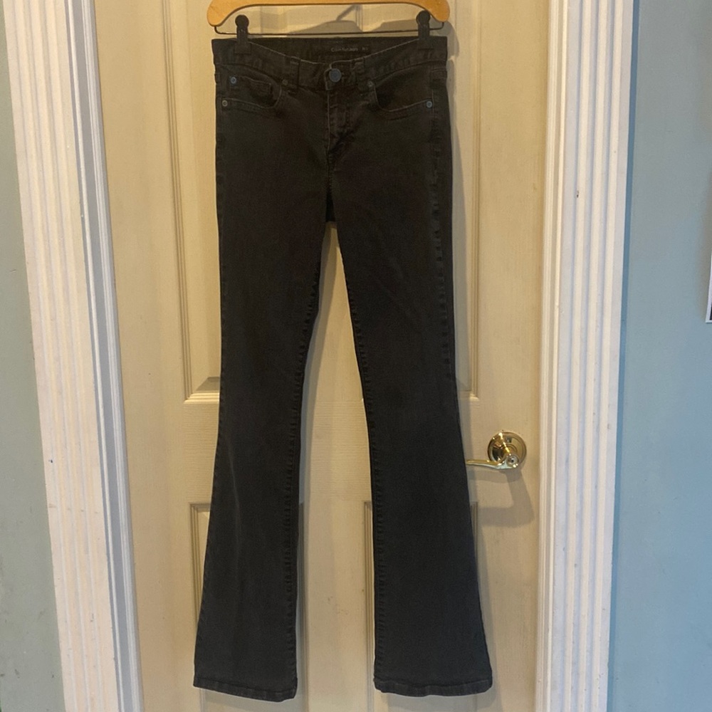 Calvin Klein women jeans size 26/2.  Skinny bootcut black jeans. RN 36009.